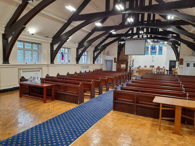 A picture containing indoor, floor, table, ceiling

Description automatically generated